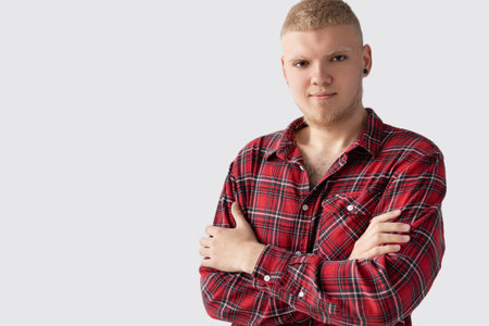 Portrait of a man presenting a blank banner.