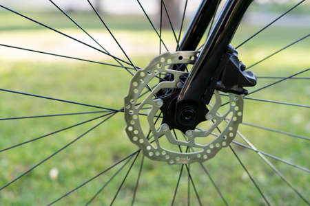 Part of the brake disc of a mountain bike close-up. Copy spaceの写真素材