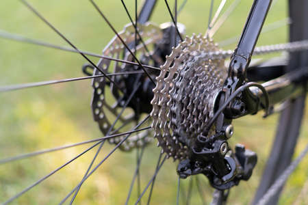 Close up of bicycle gears mechanism and chains on the rear wheel of a mountain bike. copy spaceの写真素材