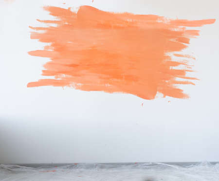 home renovation concept, big orange spot on white wall.の写真素材