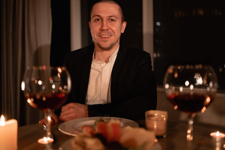 romantic dinner for valentines day, man on february 14 at a table with wine, one lonely holiday love...