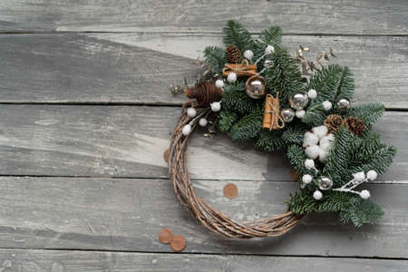 Eco Christmas wreath on a wooden background. Top viewの写真素材