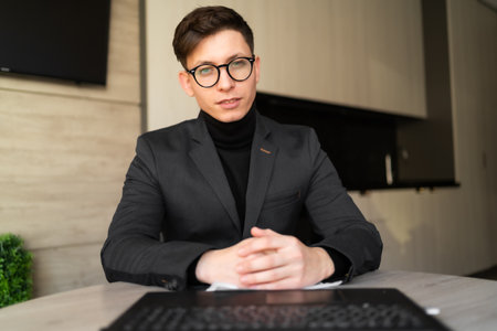 male coach teacher webinar talking looking camera giving online class a lecture, webcam view, conference video chat call, entrepreneur or businessmanの写真素材