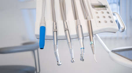 Close up of modern dentist tools, polishing machines with blurred background. copyspace.の写真素材