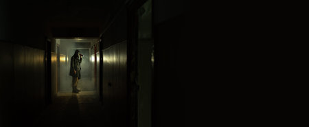 Brave post apocalyptic survivor with gas mask and flashlight. environmental disaster, crime and...