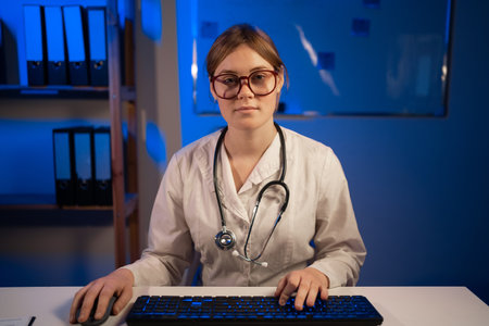 Young female doctor make online telemedicine video call consult patient. Webcam view, face headshot. copy spaceの写真素材