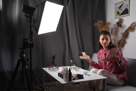 influencer record live viral video camera at home studio. Happy girl fun talk speak advice review hobby in media. Vlogger selfie shoot enjoy work show smile teach do make up at home. copy spaceの写真素材