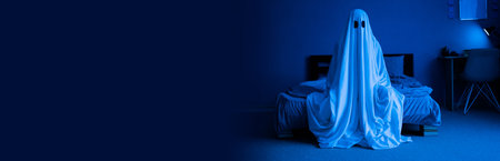 Ghost sits in the room on bed, halloween and horror concept, bannerの写真素材