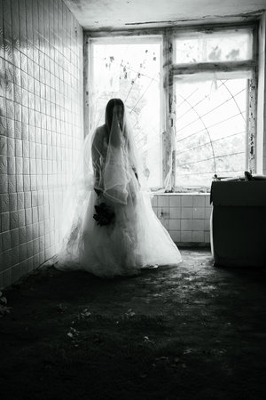 Bride ghost story. Halloween night at an abandoned house.の写真素材