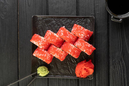 Sushi set with masago caviar, avocado and salmon. Asian cuisine. Sushi menu concept. Top view.の写真素材