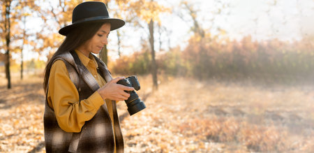Caucasian photographer, creates stunning shots. standing in a clearing, holding a camera in his...
