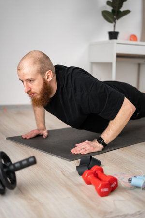 Close-up. young man stands on his hands. Physical exercise. Healthy body