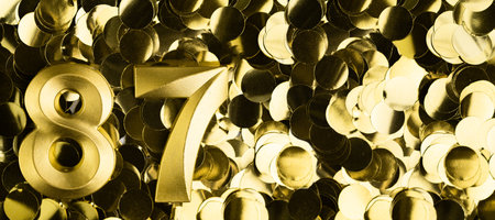 Golden number eighty-seven 87 candle on shiny yellow confetti background. Festive backdrop for eighty-seventh birthday, anniversary, or celebration. Bright greeting card with space for text.の写真素材
