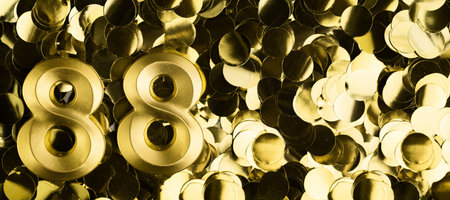 Golden number eighty-eight 88 candle on shiny yellow confetti background. Festive backdrop for eighty-eighth birthday, anniversary, or celebration. Bright greeting card with space for text.の写真素材