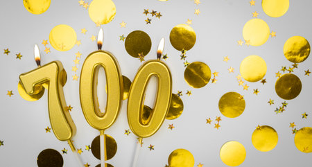 700 online community fans. 700 followers card. social networks, blogs and subscribers card. Festive Background. Social media.の写真素材