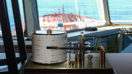 A barograph on the bridge of a tankerの写真素材