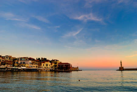 View of the port of Chania with the old city in Crete of Greece at sunriseのeditorial素材