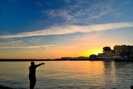 View of the port of Chania in Crete of Greece at sunriseの写真素材