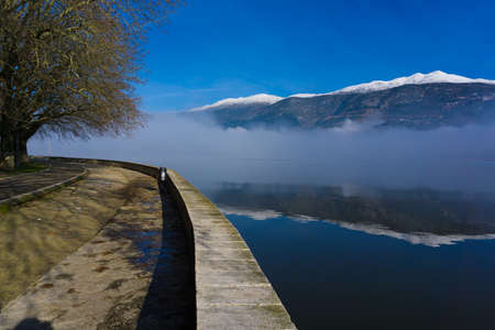 Misty lake of Ioannina (Pamvotis) in the morning in Greeceの写真素材
