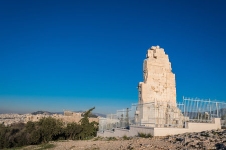 The Philpappos monument in Athens Greece. An ancient Greek mausoleum dedicated to Philopappus a prince from the Kingdom of Commagene. It is located on Muses Hill in Athens, Greece, southwest of the Acropolisの写真素材