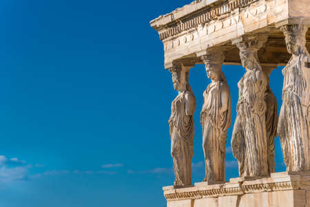 The Caryatids of the Erechtheion in Acropolis Athens Greece. A caryatid is a sculpted female figure serving as an architectural support taking the place of a column or a pillar supporting an entablature on her headの写真素材