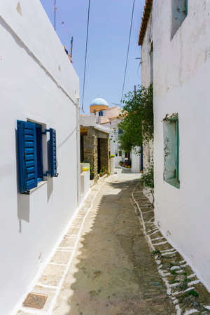 Street view in Driopis (Driopida), the traditional village of cycladic island Kythnos in Greeceの写真素材