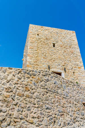 A tower in Mani in Greece. The Towers of Mani are military hallmarks. The need of fortifying the Mani home with a tower was the centralization and the segregation of society into clans or families.の写真素材