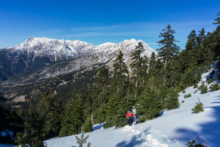 Hiking to reach the summit of Dourdouvana mountain in Peloponnese Greeceの写真素材