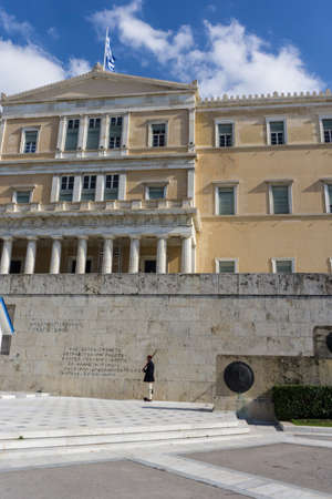 A guard (tsolias) in front of the greek parliament in Athens Greeceの写真素材