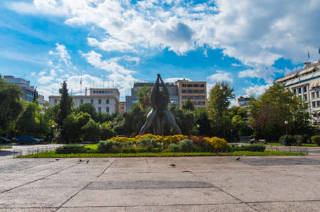 Klathmonos square is the center the Historical Center of Athens. In the square is an impressionistic monumental bronze sculptural group of three intertwined figureのeditorial素材