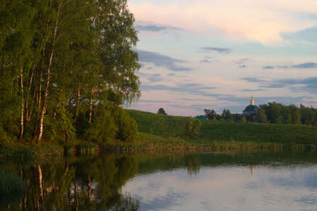 Sunset on the lake in the springの写真素材