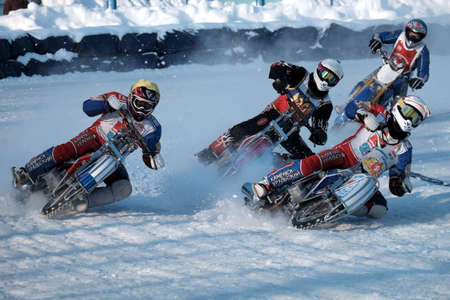 Competition in motorcycle racing on ice in the winter in sunny weatherのeditorial素材