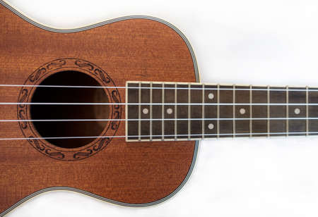 Part of the ukulele on white background isolated imageの写真素材