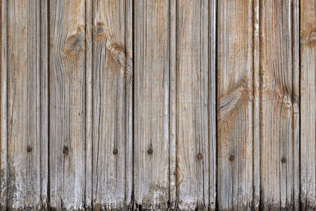 texture of old boards with remnants of brown paintの写真素材