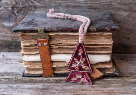 vintage Church book with a leather clasp on a wooden table