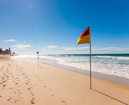 Flag on the Surfers Paradise Beach in Gold coast, Australia の写真素材