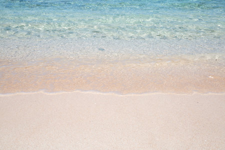 Wave of the sea on the sand beach in Guam