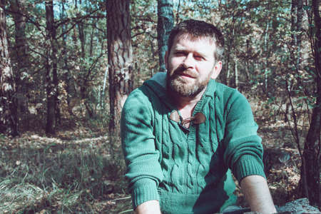 Portrait of a bearded man in the forestの写真素材