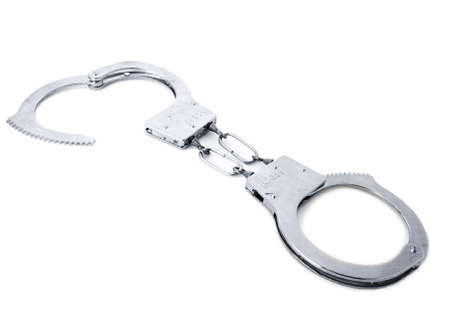Handcuffs isolated on whiteの写真素材