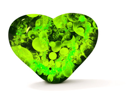Green heart isolated on whiteの写真素材