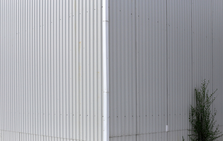 Wall of corrugated metal. Perspective up. Long thin lines. Elegant design.の写真素材