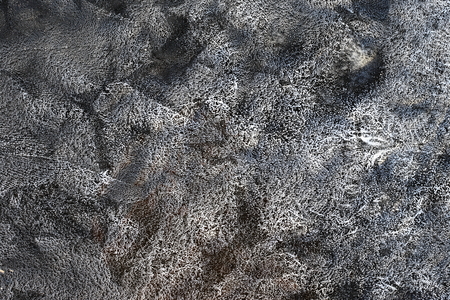 Air bubbles in the thickness of ice. Large, round and white.の写真素材