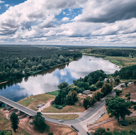 drone image. aerial view of rural area with fields and forests in sunny summer day. latvia