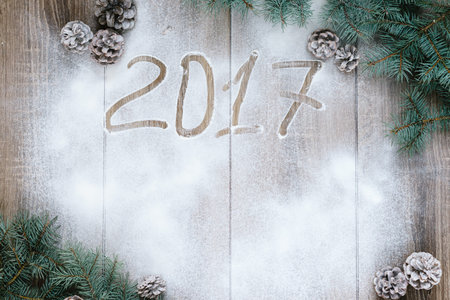 wood background, tree branches, cones, snow, a place for an inscription, congratulation norim yearの写真素材