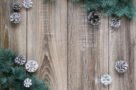 wood background, tree branches, cones, snow, a place for an inscription, congratulation norim yearの写真素材