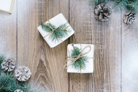wood background, tree branches, cones, snow, a place for an inscription, congratulation norim yearの写真素材