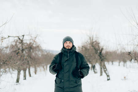 men walk in the winter garden, winter walkingの写真素材