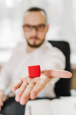 Business man in white shirt is preparing a gift for women employeesの写真素材