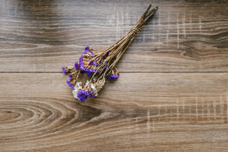 bouquet of wild flowers for decoration, on a wooden backgroundの写真素材
