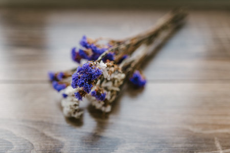 bouquet of wild flowers for decoration, on a wooden background